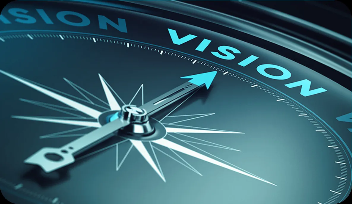 Compass needle pointing towards the word “VISION” symbolizing strategic direction and future goals